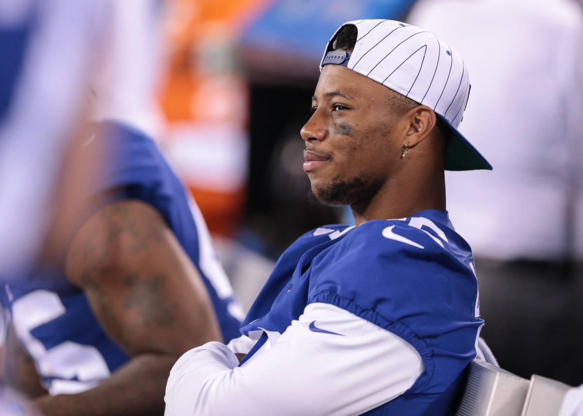 August 16, 2019, New York Giants running back Saquon Barkley (26) looks on  during the NFL preseason game between the Chicago Bears and the New York  Giants at MetLife Stadium in East