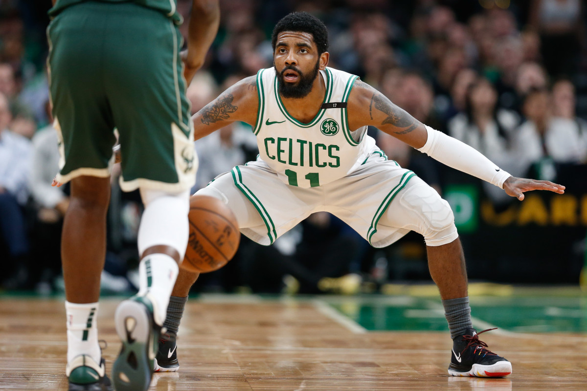 Nets PG Kyrie Irving elbowed in face during pick-up game; taken to ...