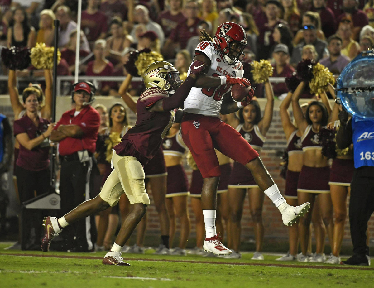 Devin Carter catches a pass for NC State in tonight's game at Florida State (Melina Myers/USAToday sports)