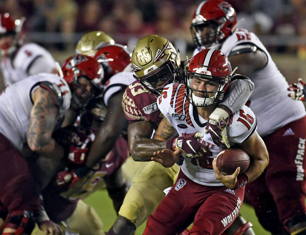 Quarterback Bailey Hockman is sacked by FSU's Amari Gainer during Saturday's loss in Tallahassee