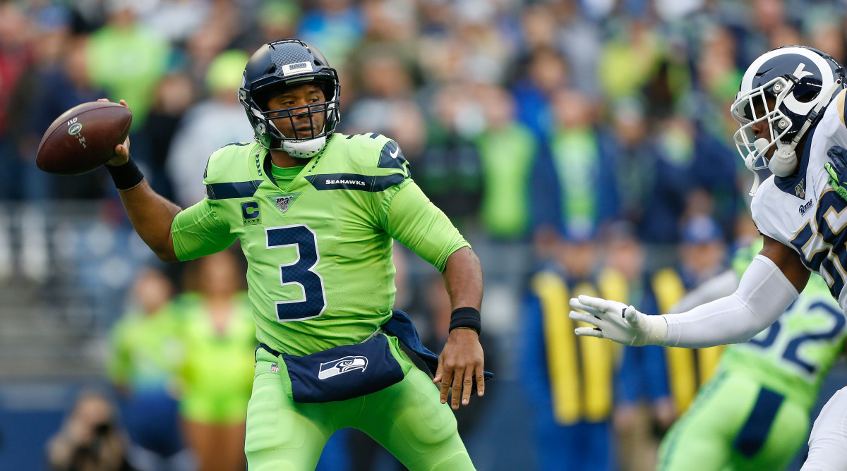 Russell Wilson throws 5 TD passes as Seahawks beat Ravens – The