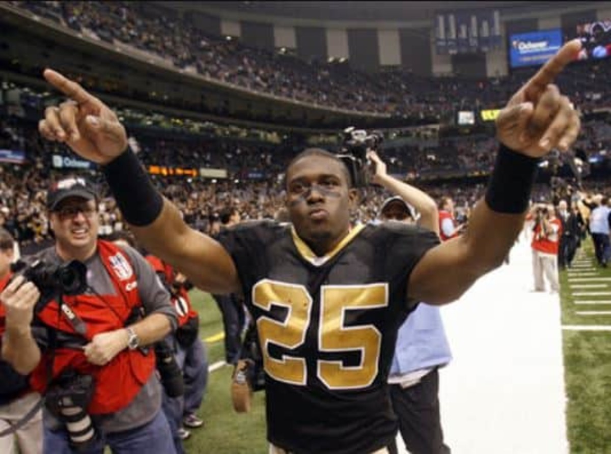 Photo: Preseason New Orleans Saints Reggie Bush rushes against New England  Patriots at Gillette Stadium - BOS2010081208 