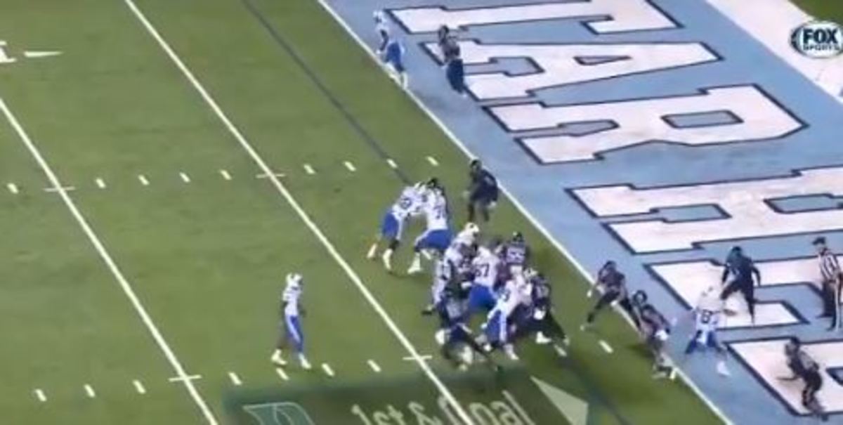 Lower right (by the Es in "Heels" in the end zone) four UNC defenders have Gray completely boxed in.