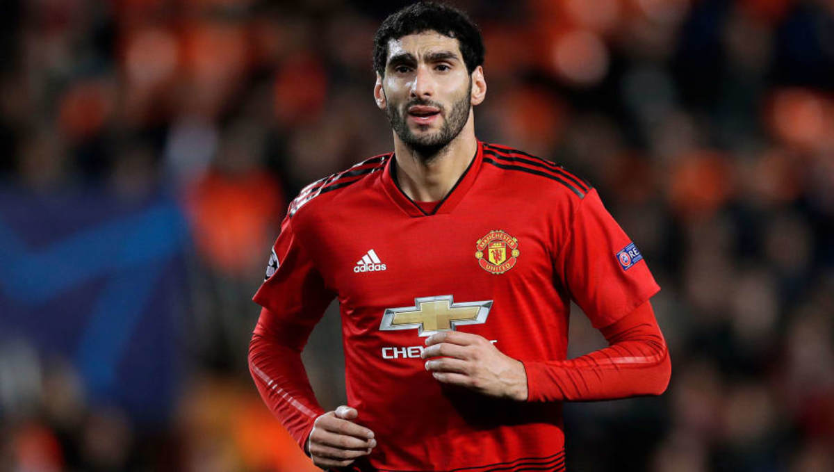 Marouane Fellaini: China's Shandong Luneng inks Man United ...