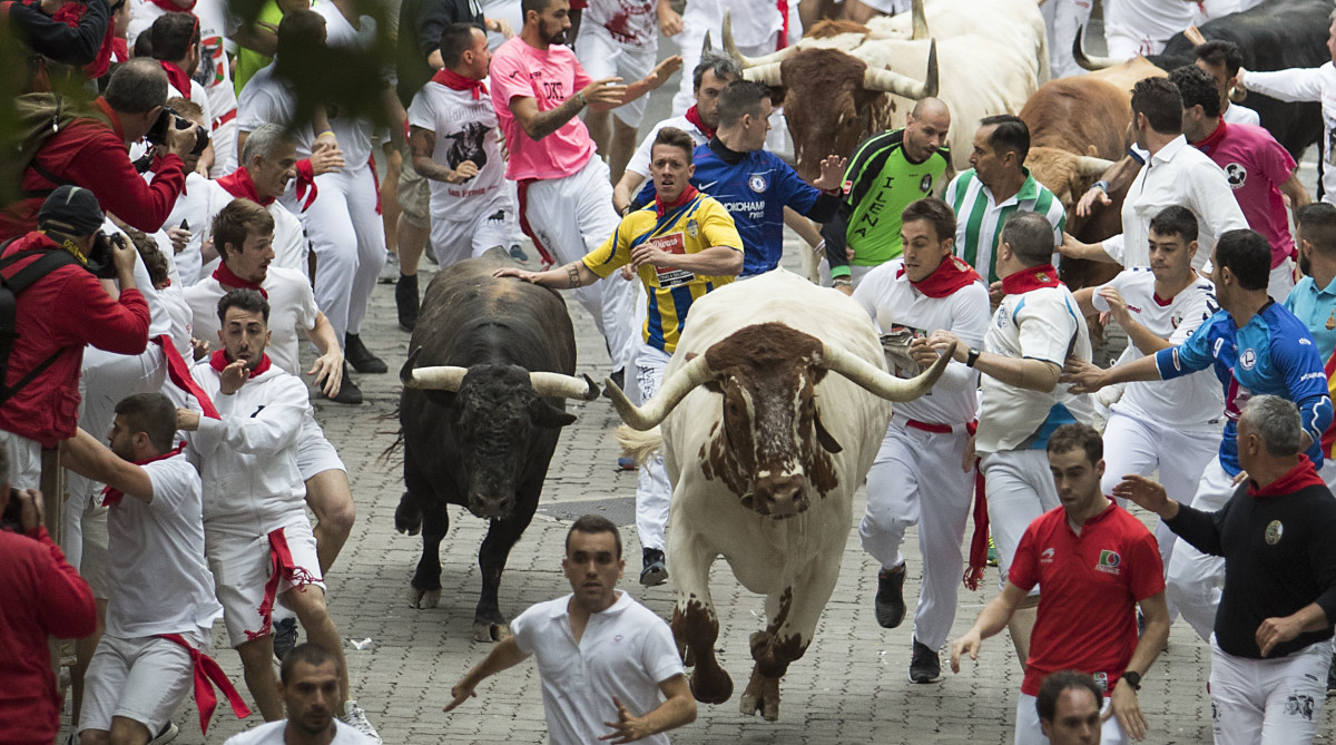 Three runners are gored in a tense 5th Pamplona bull run : NPR