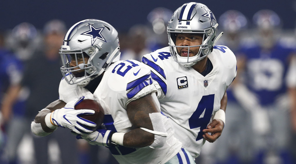 Dak Prescott, Ezekiel Elliott embrace at midfield after Cowboys-Patriots  game