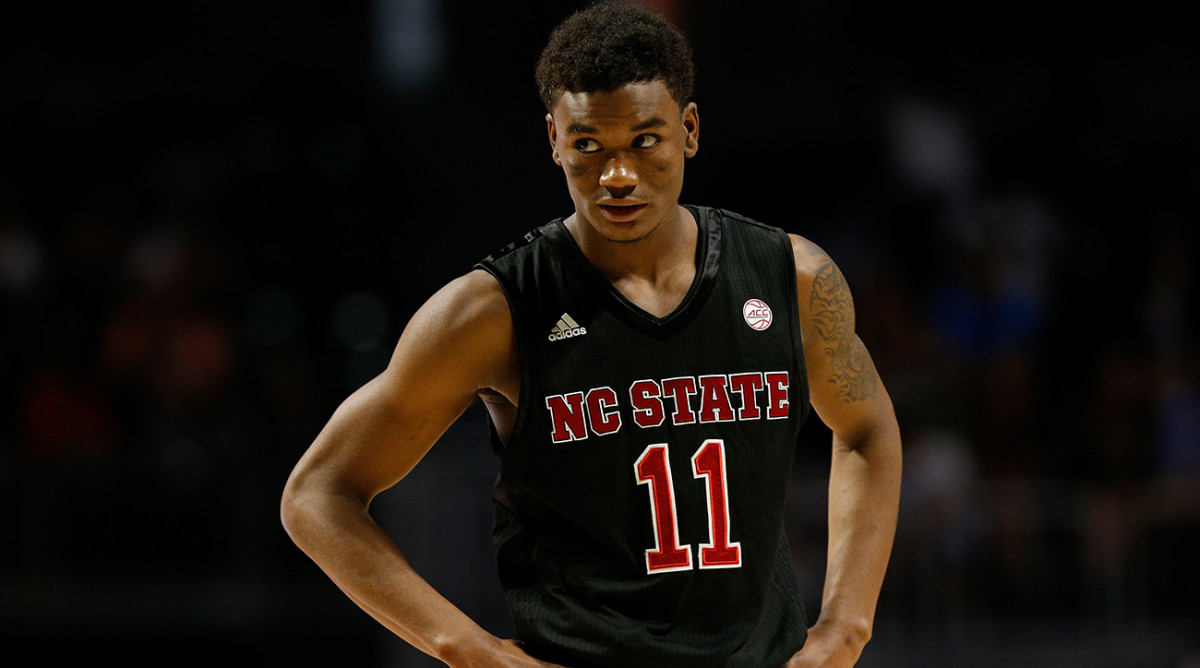 Markell Johnson injury: NC State guard leaves game after scary fall ...