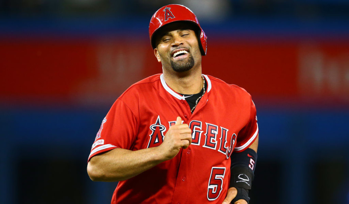 Albert Pujols gives jersey to Nico, a young fan with Down syndrome