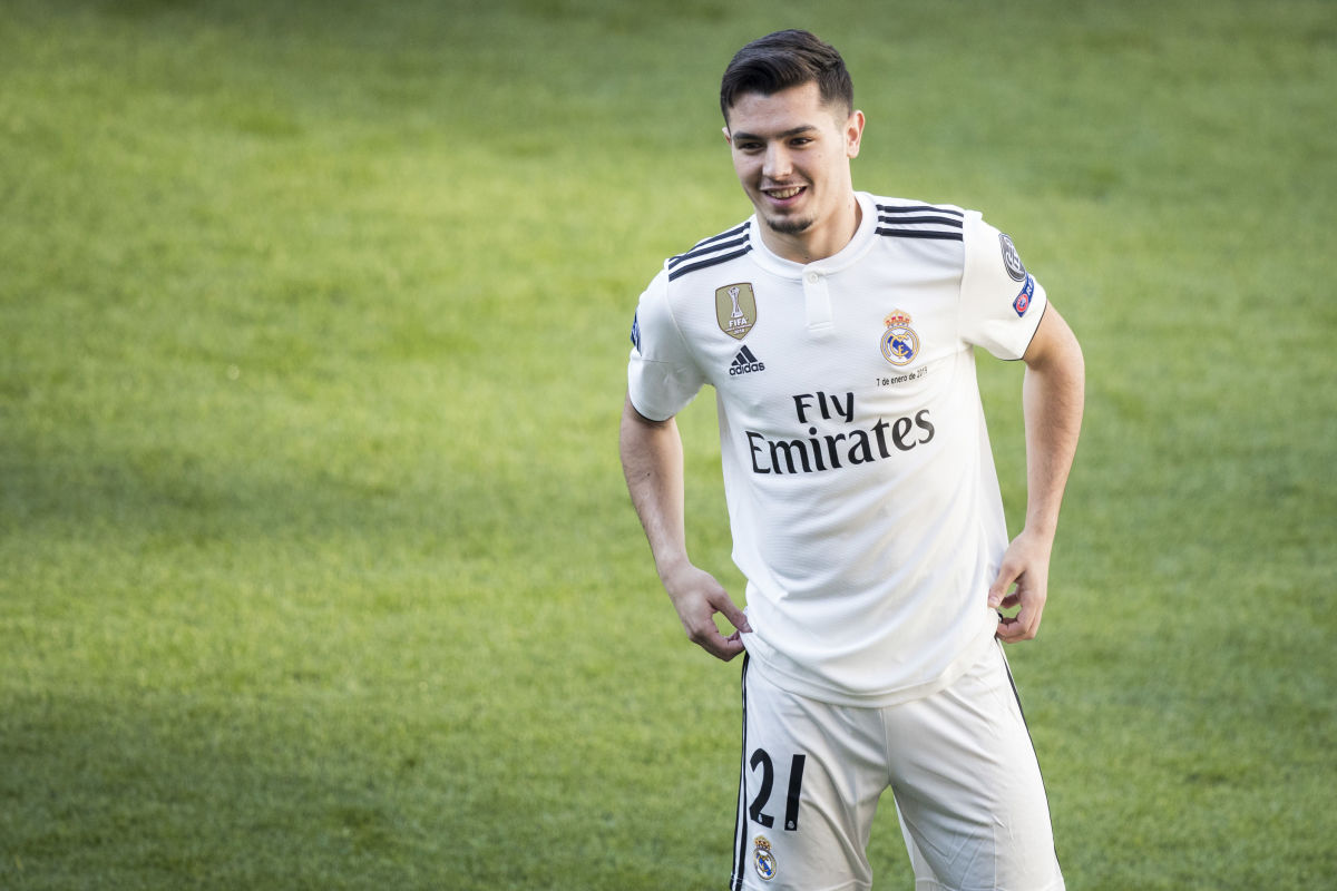 Brahim poses in the Real Madrid jersey