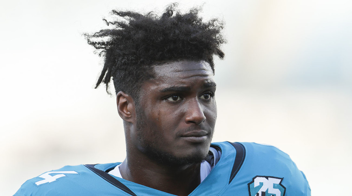 Watch: Myles Jack ejected for throwing punch, dragged off field