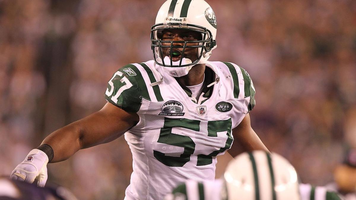 Linebacker Bart Scott of the New York Jets smiles on the bench