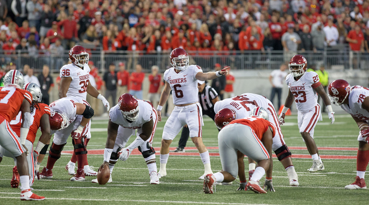 VIDEO: Baker Mayfield Sends Defender Flying With Record-Setting Throw