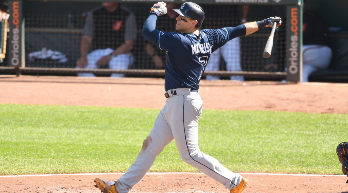 Seattle Mariners' first baseman Logan Morrison catches the throw