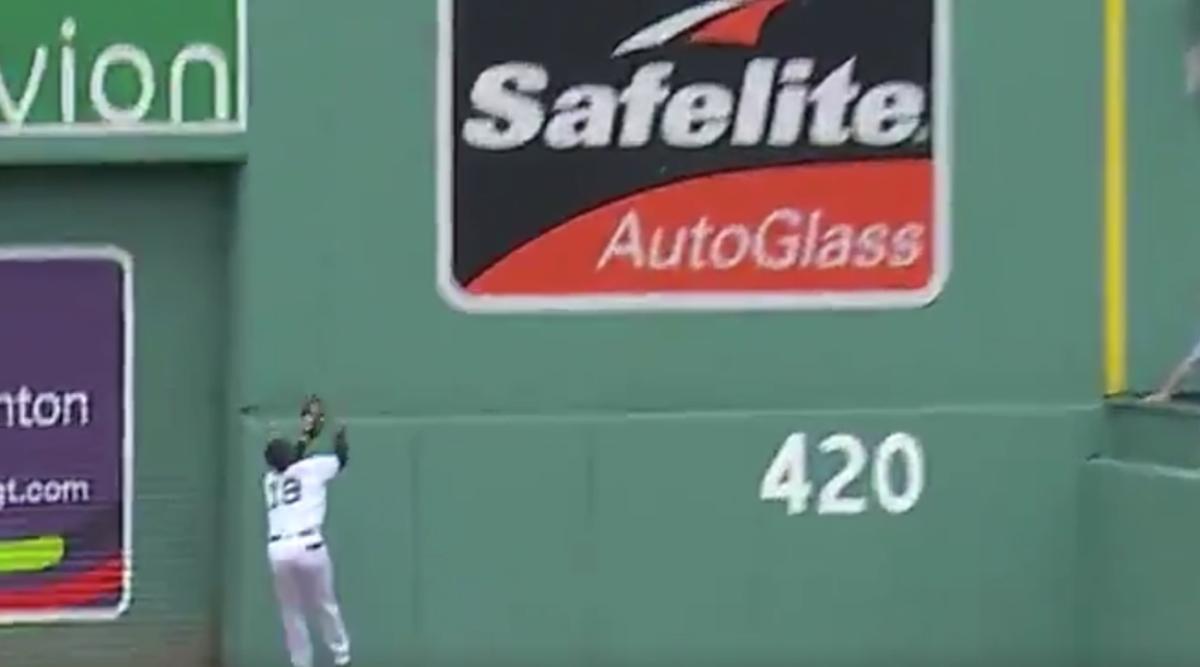 Boston Red Sox center fielder Jackie Bradley JR makes a circuit catch
