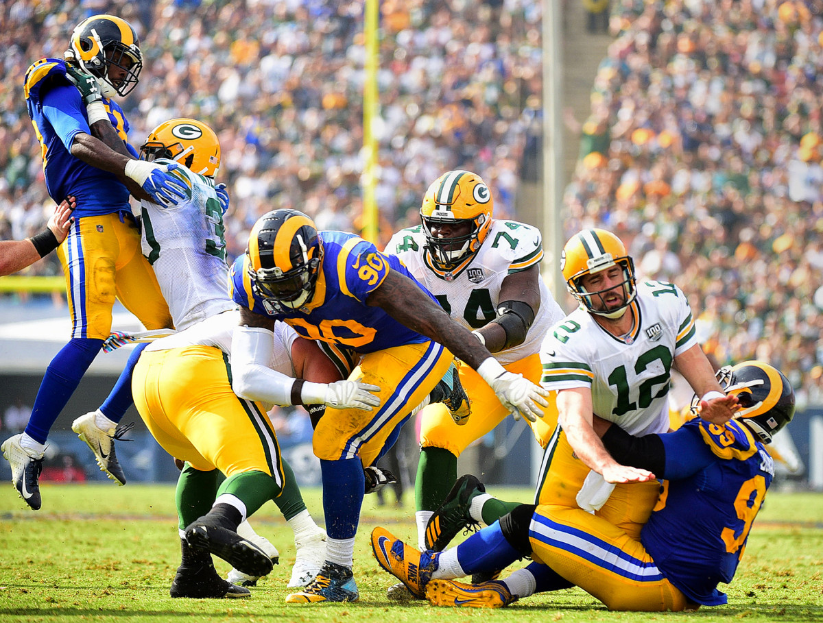Green Bay Packers QB Aaron Rodgers against Aaron Donald of the Los Angeles Rams