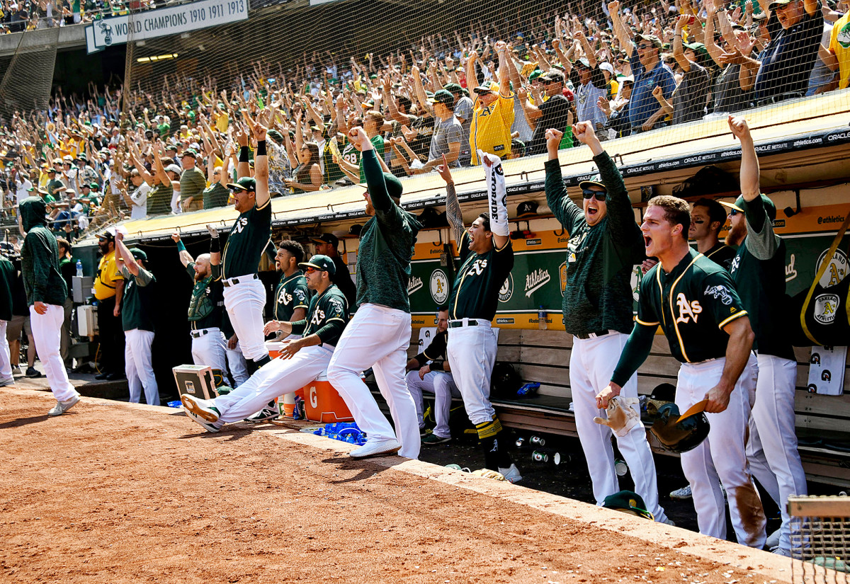 Oakland Athletics dugout in a game against the Houston Astros