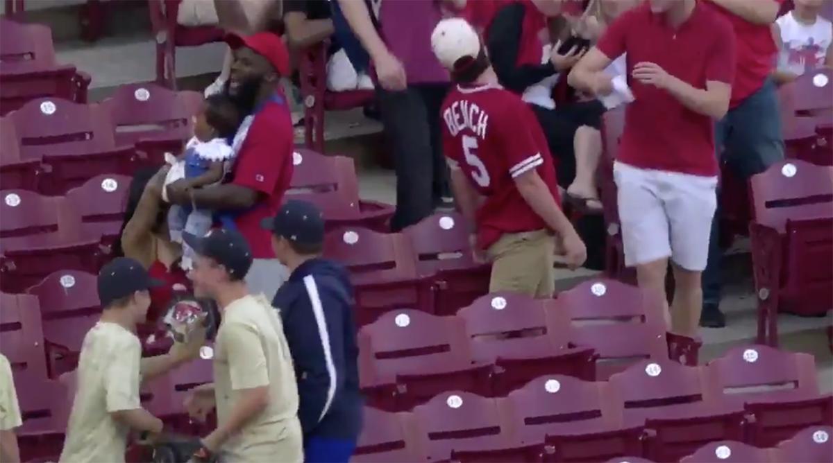 Watch Chicago Cubs baseball fan catching ball in her beer before