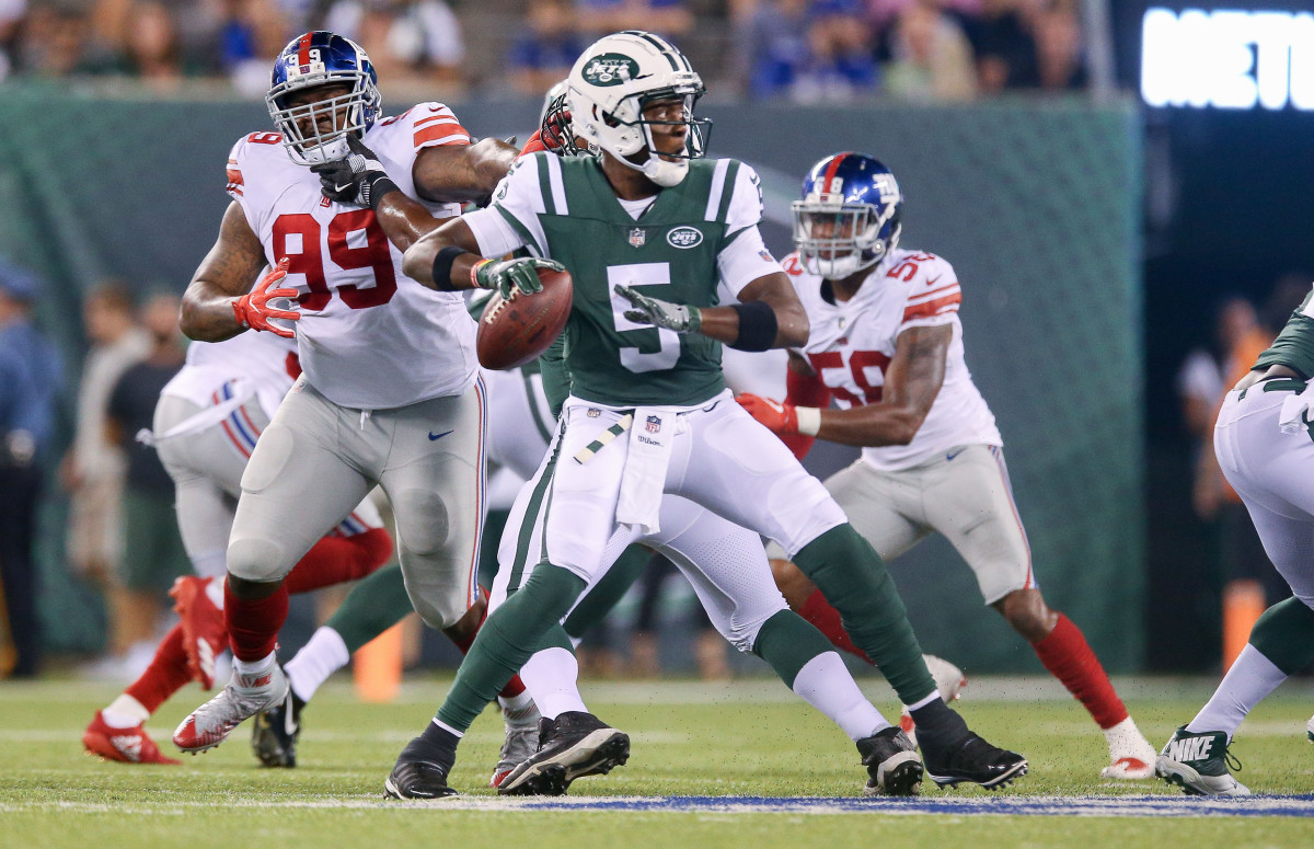 Miami Dolphins quarterback Teddy Bridgewater (5) is tackled by Las