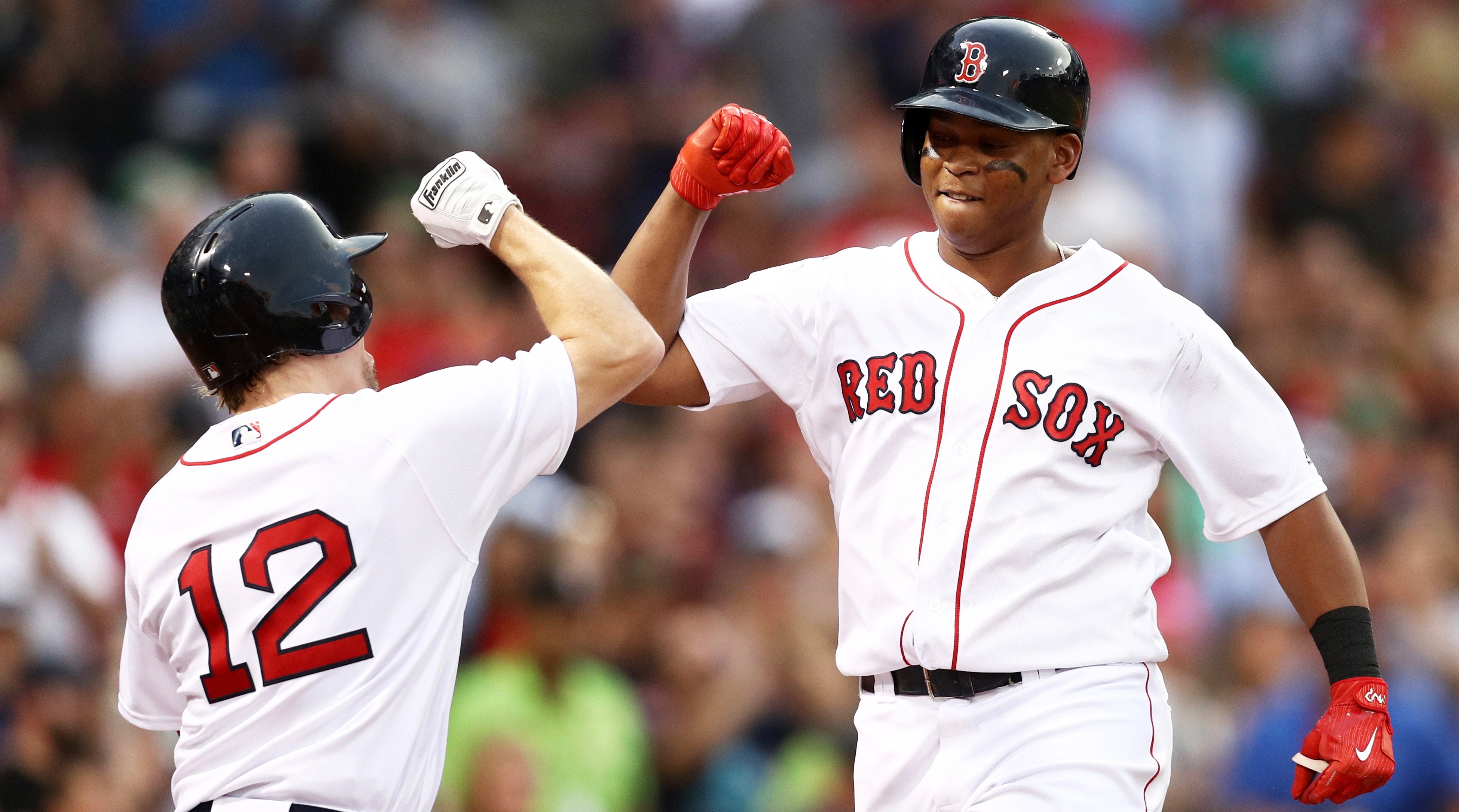 Eduardo Nunez, Xander Bogaerts, and Rafael Devers of the Boston Red News  Photo - Getty Images