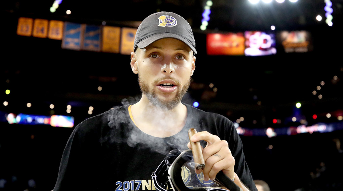 NBA Finals Stephen Curry smokes cigar on NBA TV set