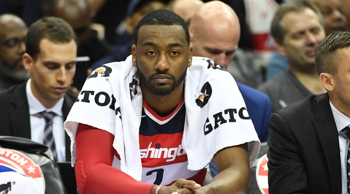 John Wall injury updates: Wizards PG out for two weeks - Sports Illustrated