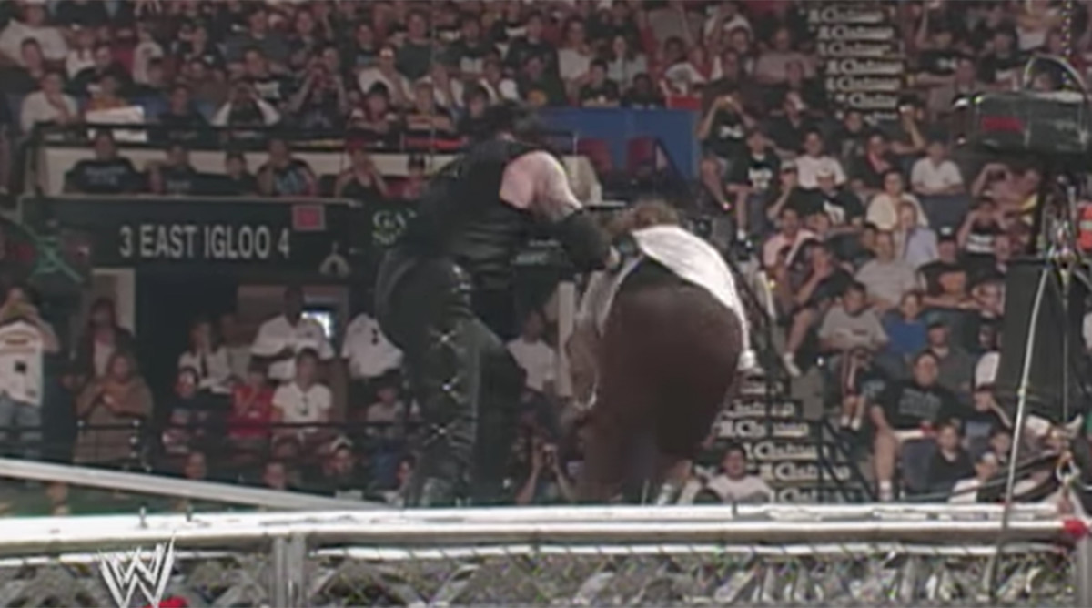 Undertaker Throws Mankind Mick Foley Off Top Of Cage Hell In A Cell