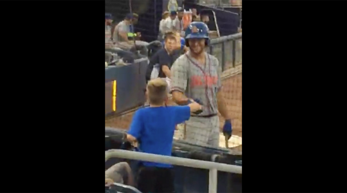 Tim Tebow Video Shakes Kids Hand Hits Home Run Sports Illustrated