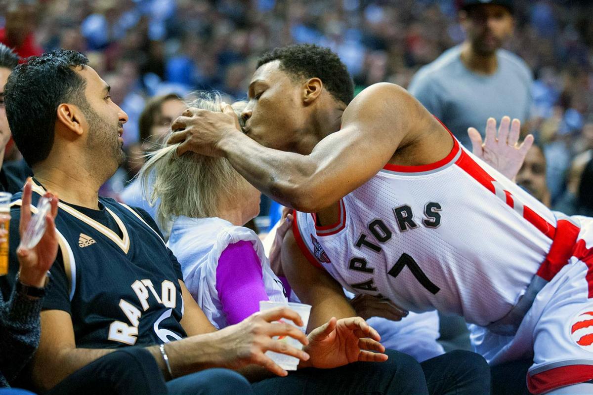 2016-0122-Kyle-Lowry-fan-head-kiss.jpg