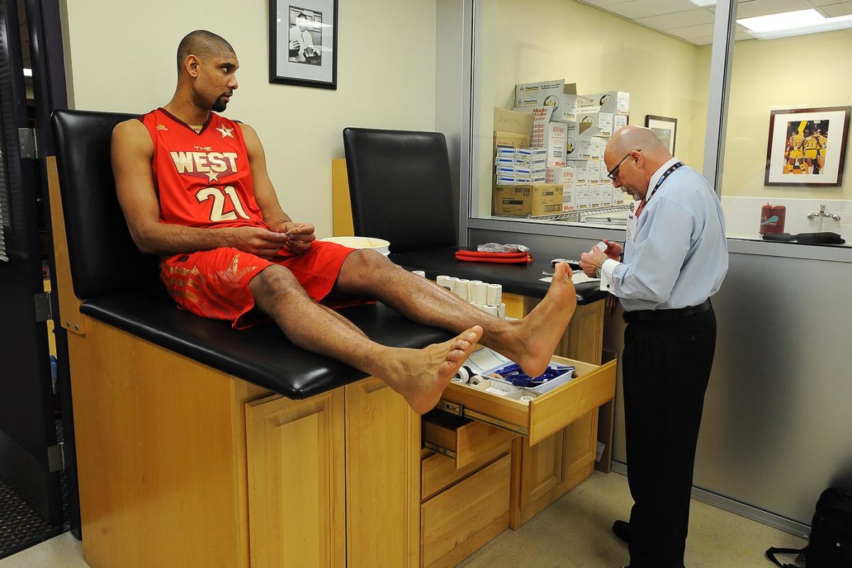 2011-0220-Tim-Duncan-Gary-Vitti.jpg