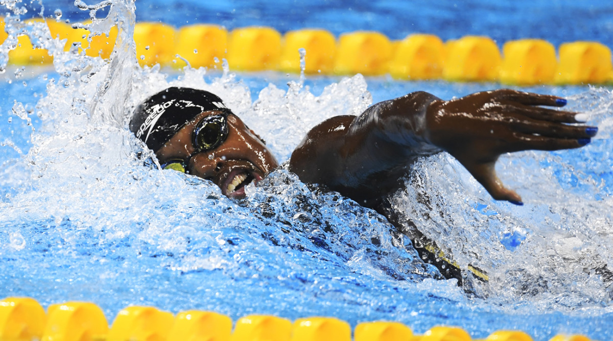 Simone Manuel: American ties for gold in 100M freestyle - Sports ...