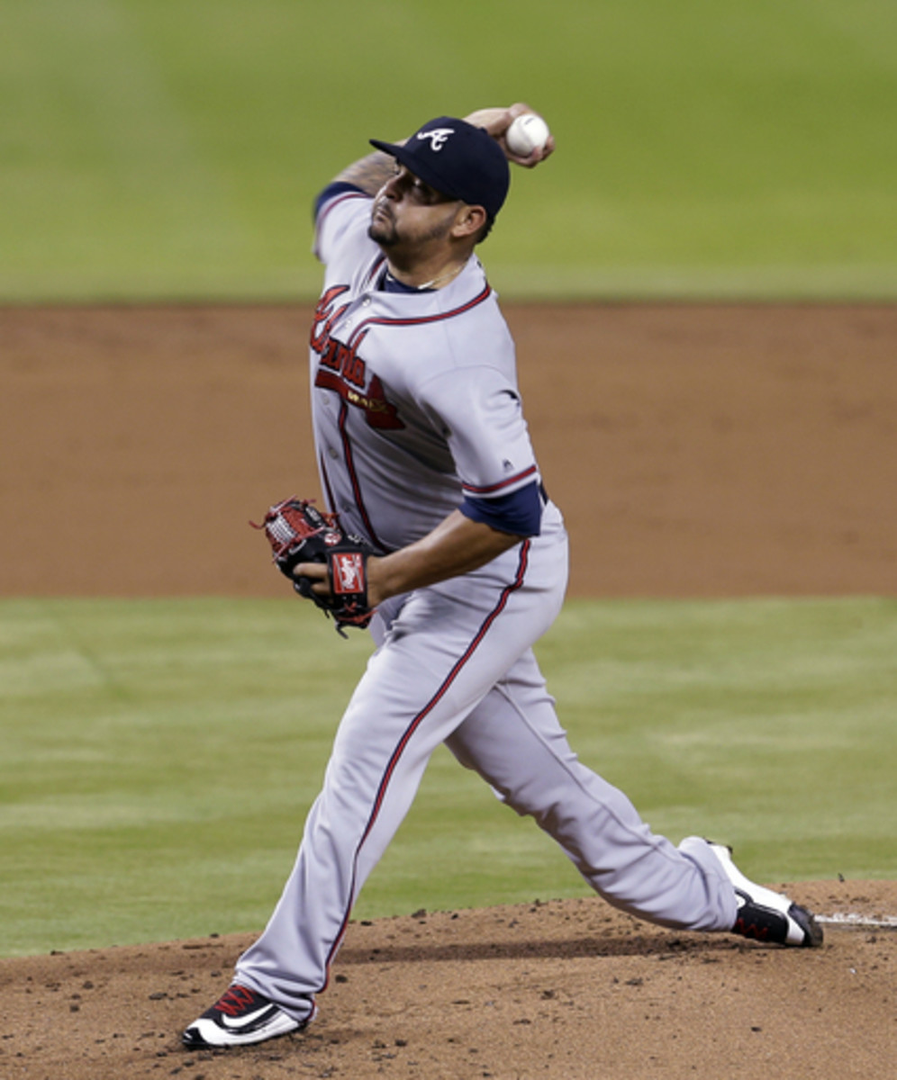 Atlanta Braves' Williams Perez pitches to the Miami Marlins during the first inning of a baseball game Friday, April 15, 2016, in Miami. (AP Photo/Alan Diaz)