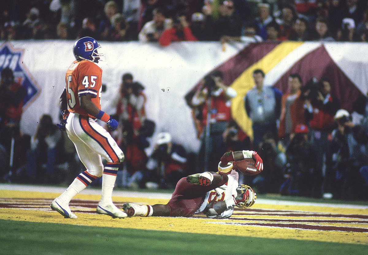 One of Smith’s two scores in Washington’s rout of Denver.