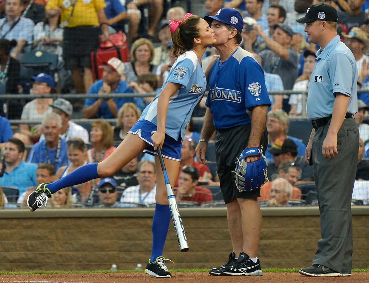 2012-0708-Chrissy-Teigen-Steve-Garvey-kiss.jpg