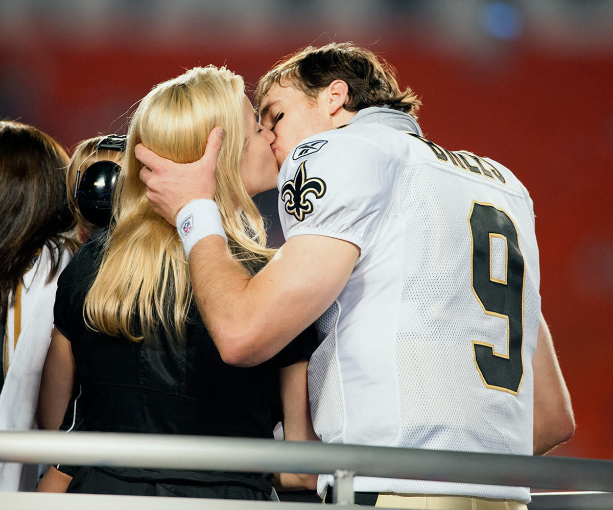 2010-0207-Drew-Brees-wife-Brittany-kiss-oprc-8468.jpg