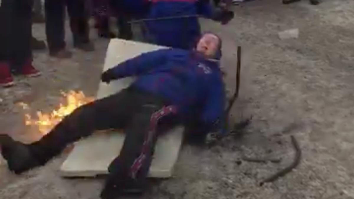 Bills fan lit on fire after breaking table during tailgate (video) - Sports  Illustrated