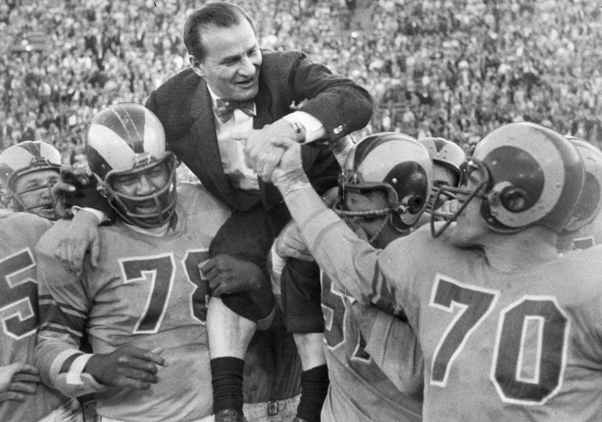 Gillman, in 1955, is carried off the field after a Rams’ win over the Packers.