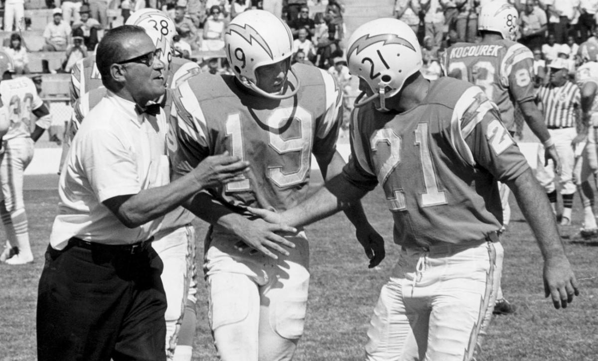 Gillman, in 1965, with Lance Alworth (19) and John Hadl