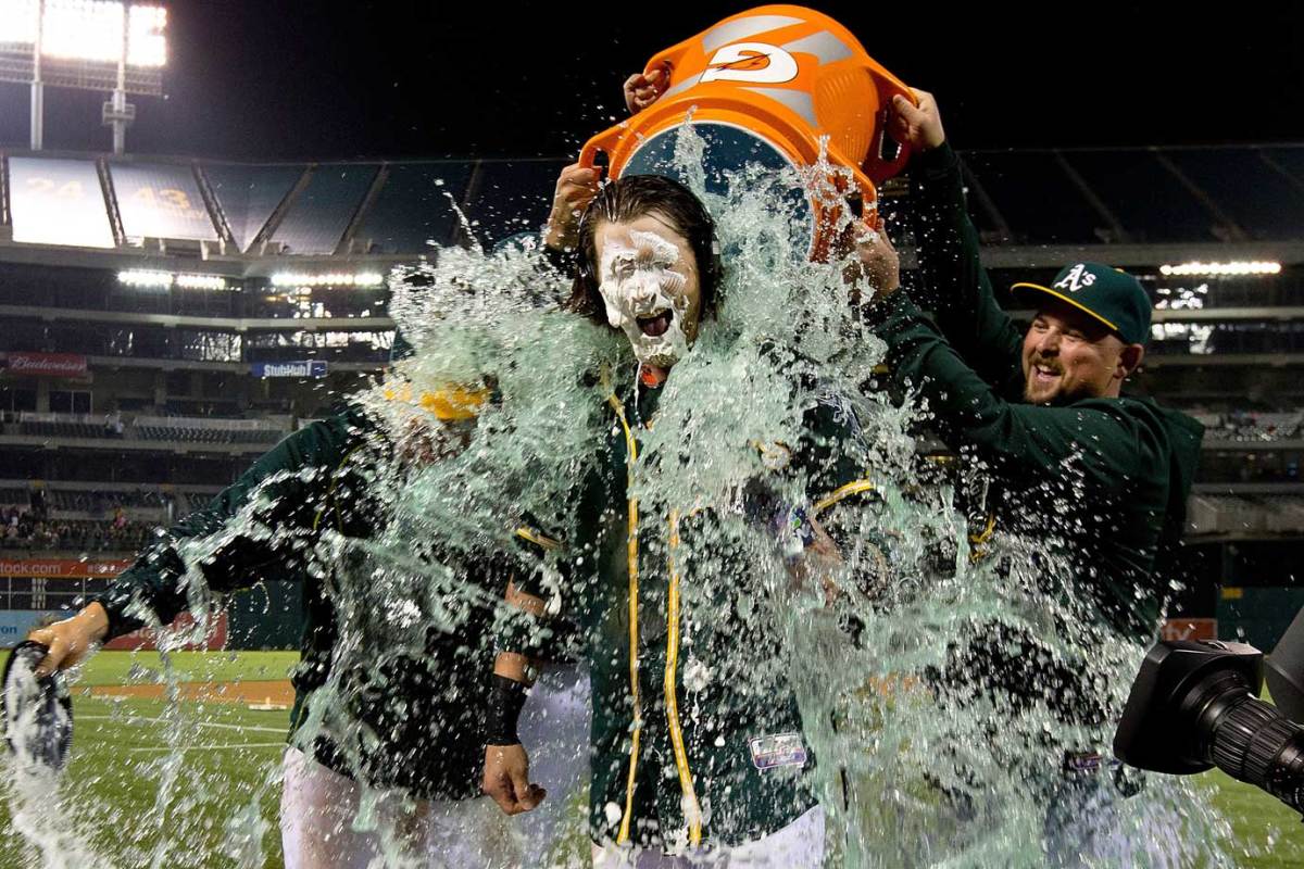 2015-0610-Josh-Reddick-doused-by--Billy-Butler-Stephen-Vogt.jpg