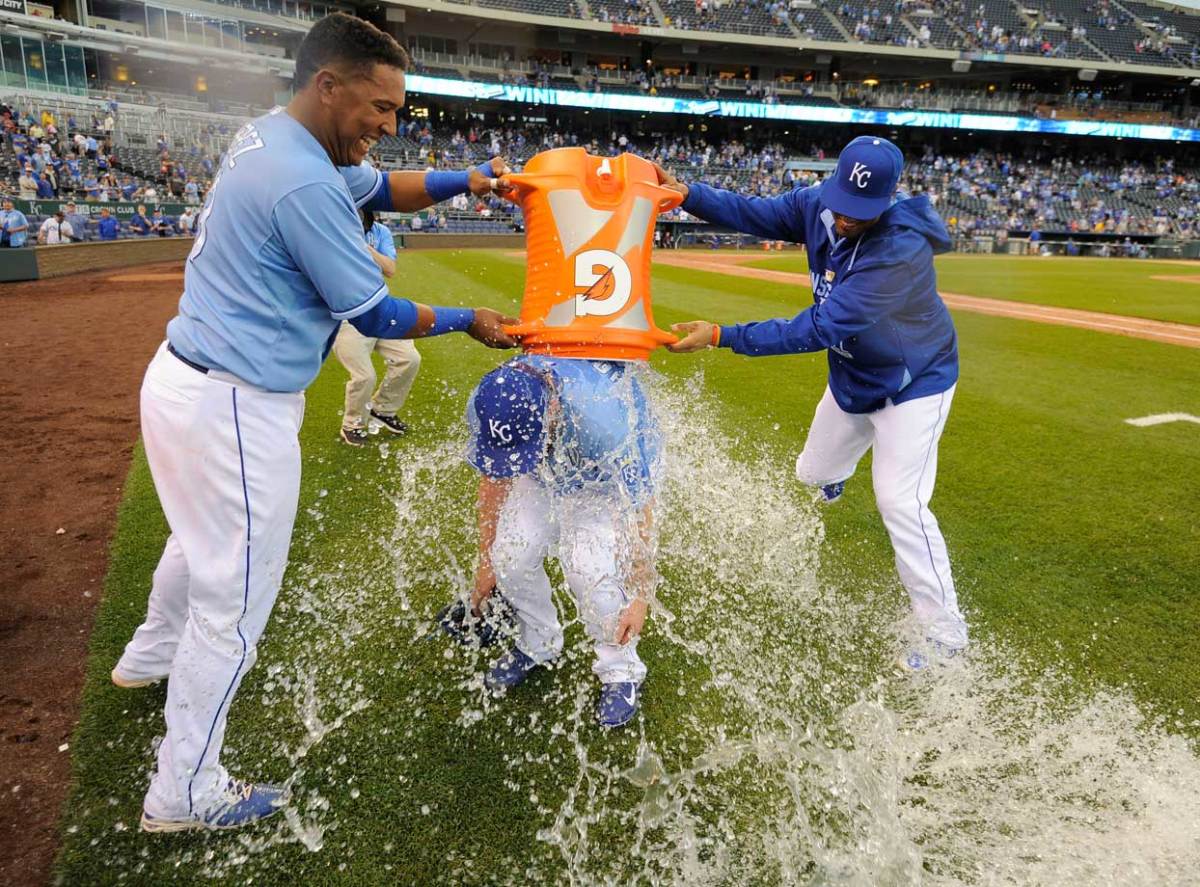 2015-0507-Greg-Holland-doused-by-Salvador-Perez-Francisco-Pena.jpg