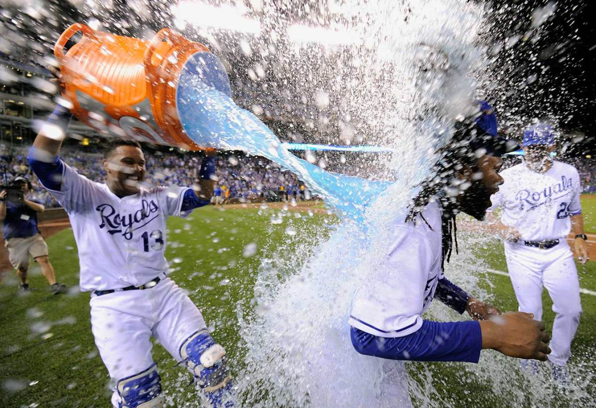 2015-0810-Johnny-Cueto-doused-by-Salvador-Perez.jpg