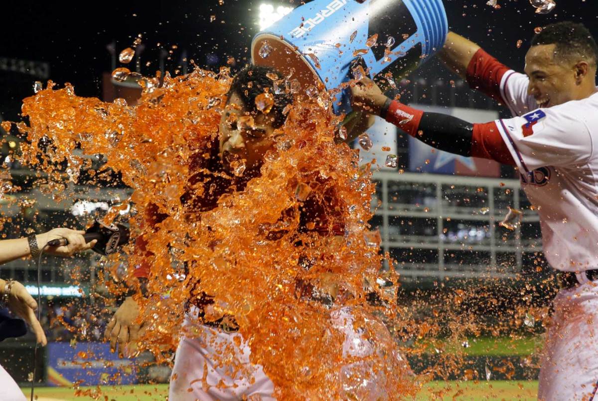 2015-0616-Robinson-Chirinos-doused-by-Leonys-Martin.jpg