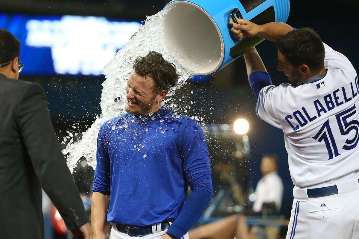 2015-0731-Josh-Donaldson-doused-by-Chris-Colabello.jpg