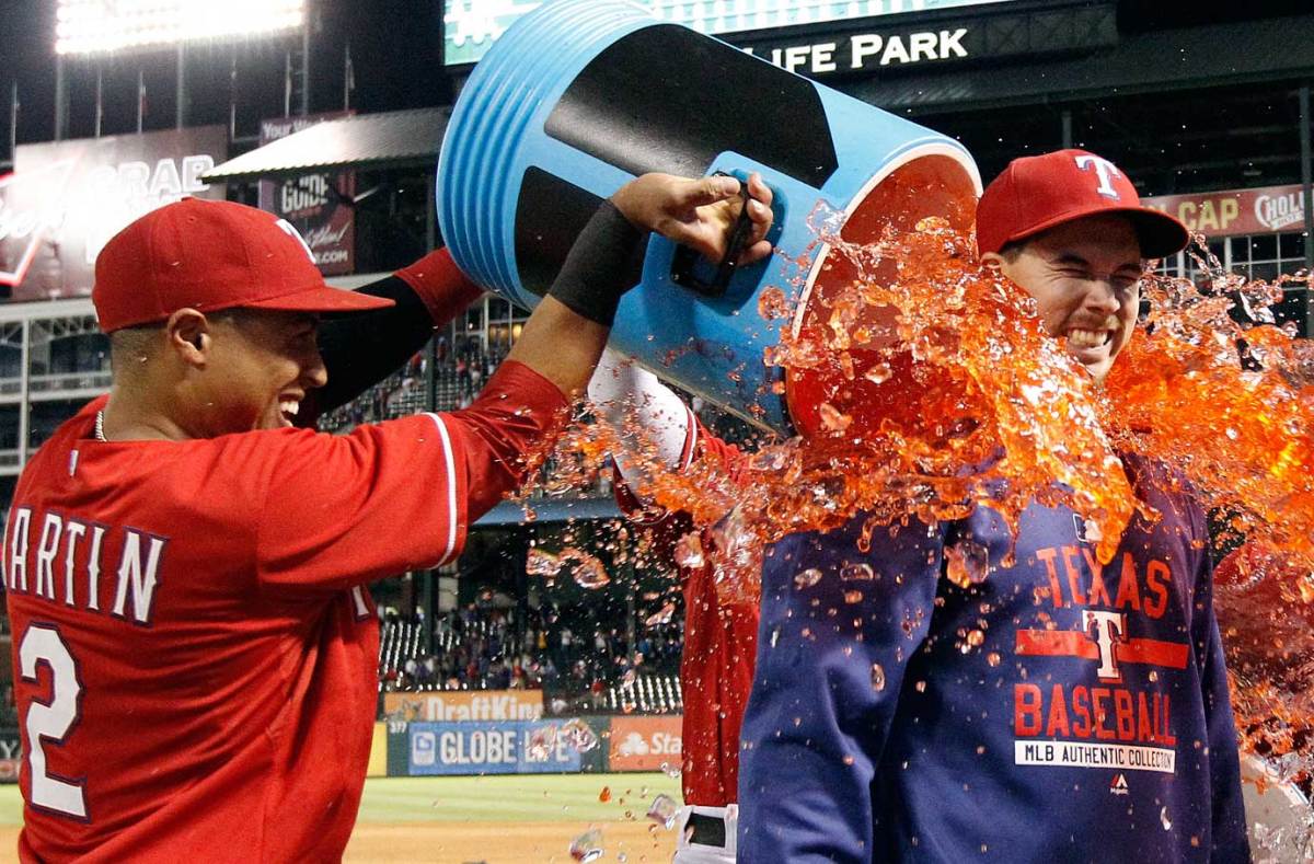 2015-0530-Chi-Chi-Gonzalez-doused-by-Leonys-Martin-Elvis-Andrus.jpg