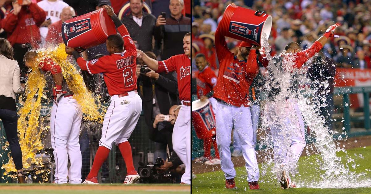 2015-0505-Carlos-Perez-doused-by-Erick-Aybar-teammate.jpg