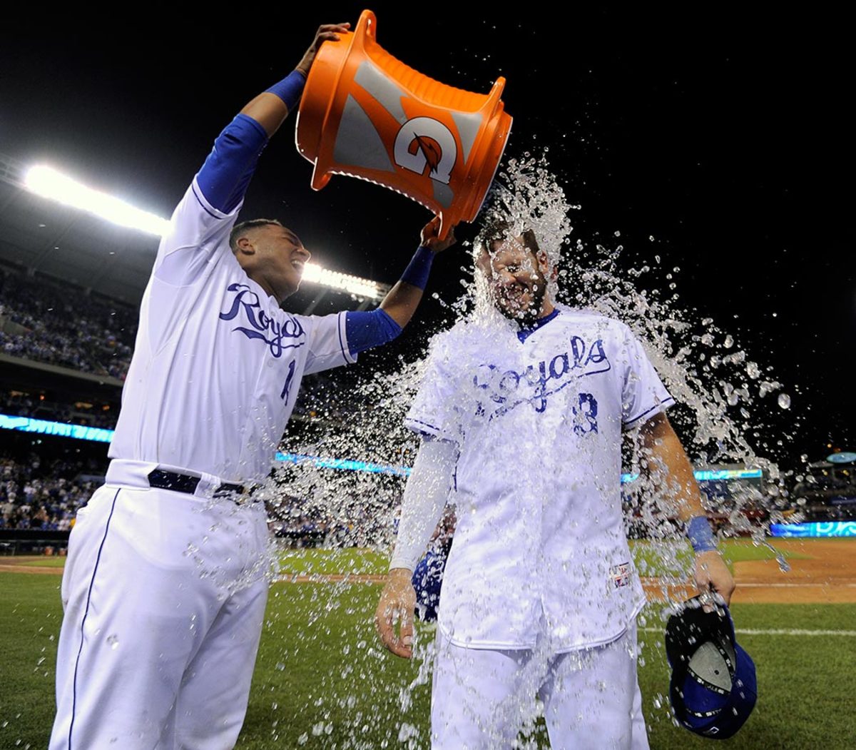 2015-0722-Mike-Moustakas-doused-by-Salvador-Perez.jpg