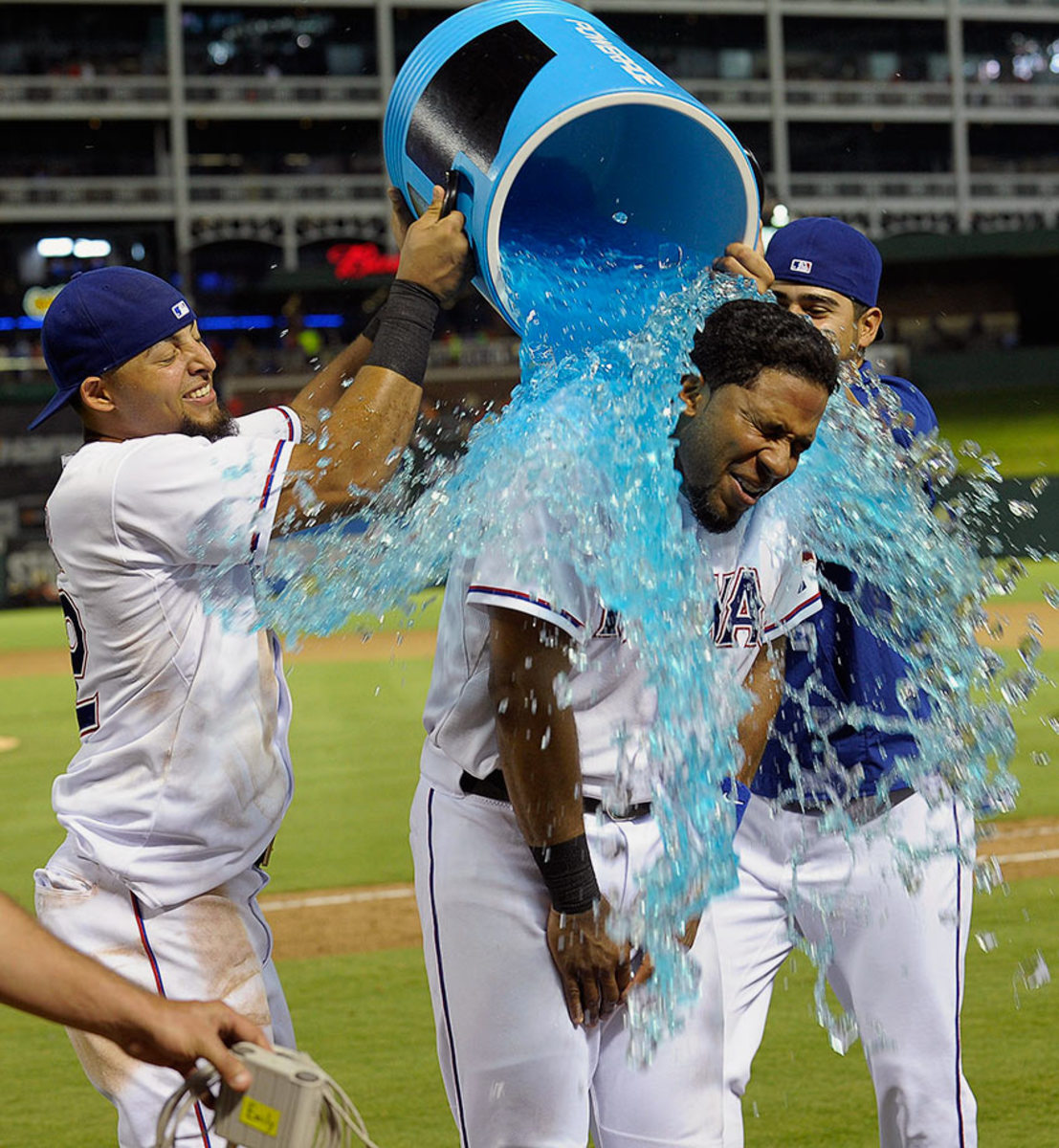 2015-0731-Elvis-Andrus-doused-by-Rougned-Odor-Martin-Perez.jpg