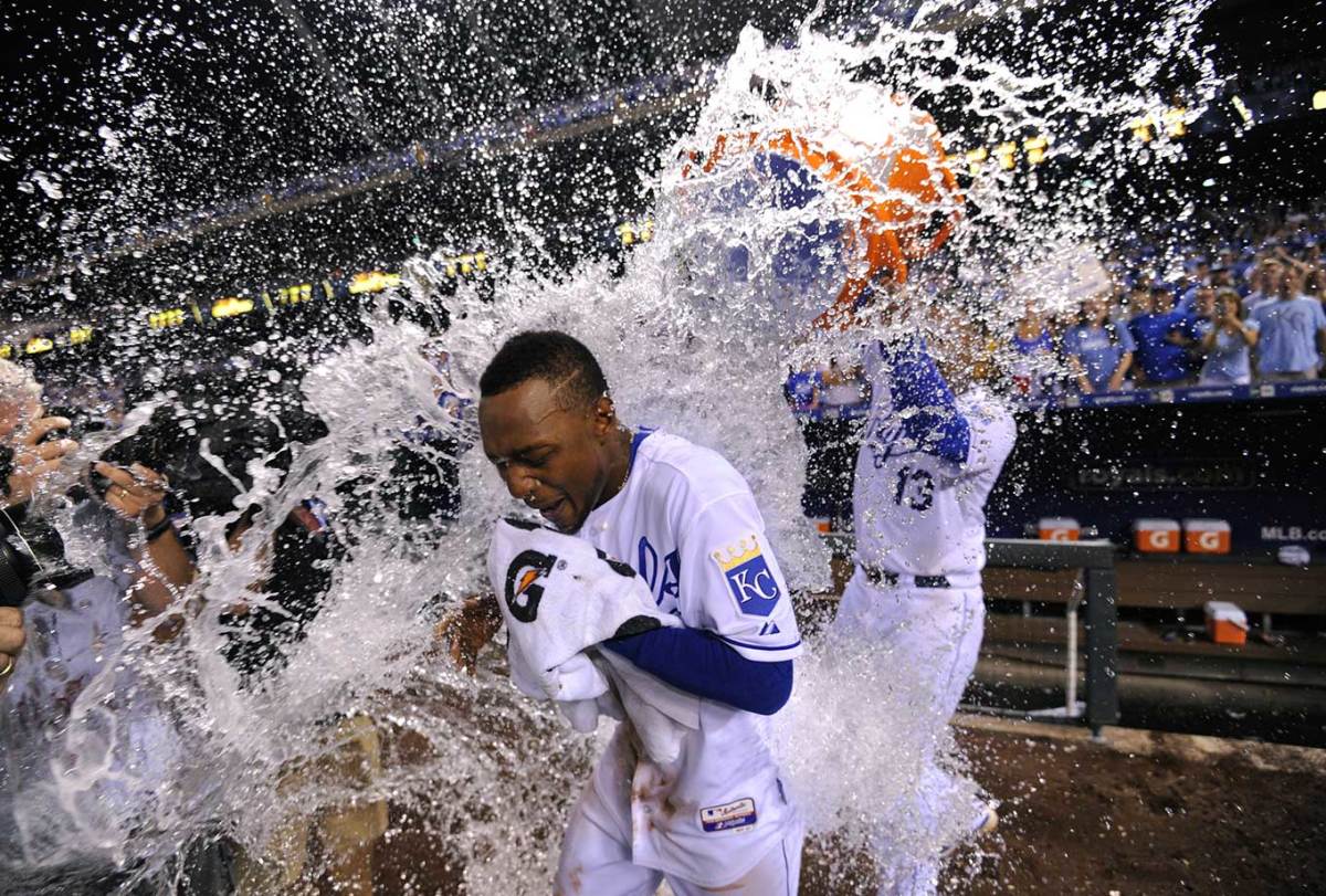 2015-0815-Jarrod-Dyson-doused-by-Salvador-Perez.jpg