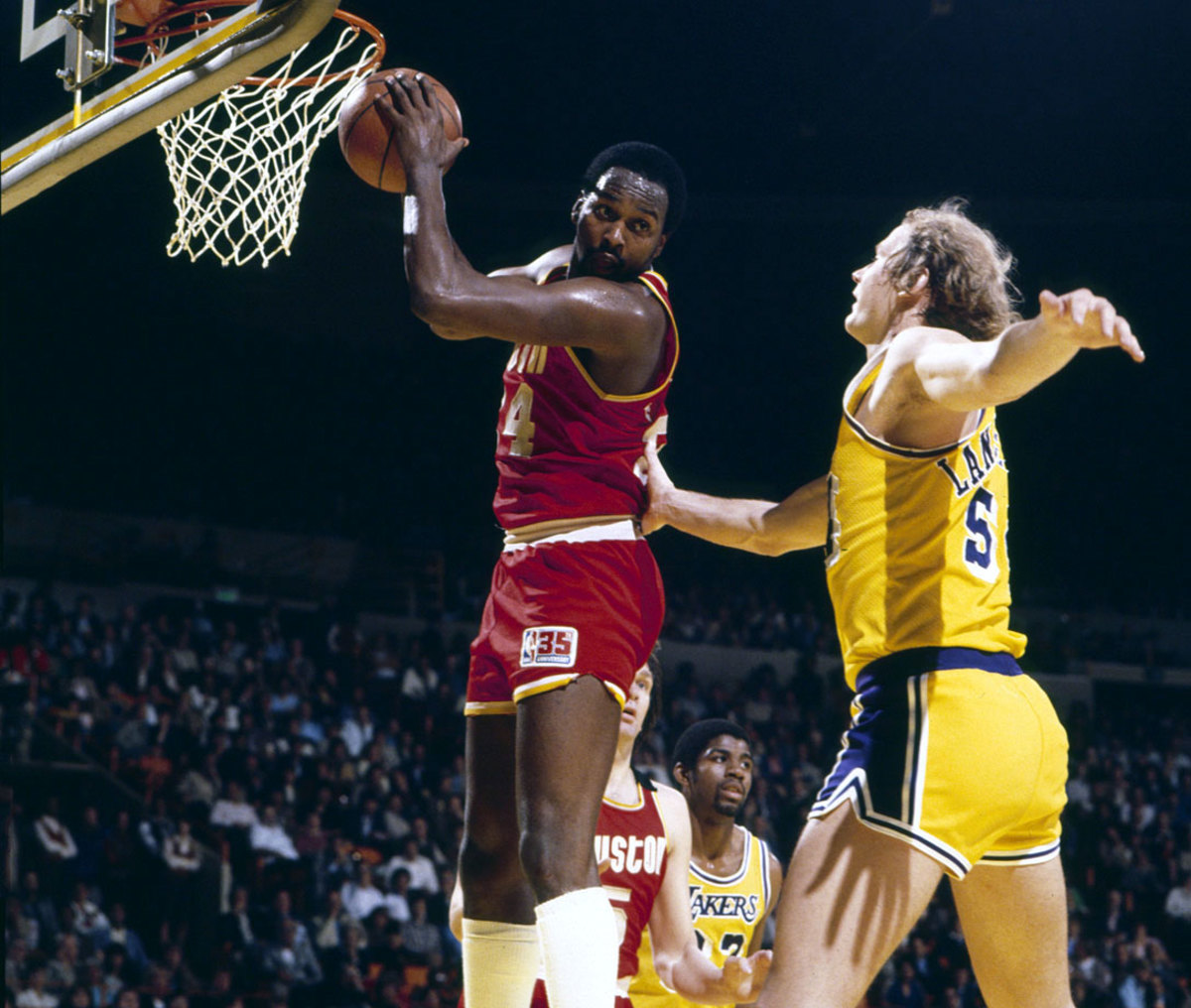 SI Photo Blog — Moses Malone of the Houston Rockets drives to the