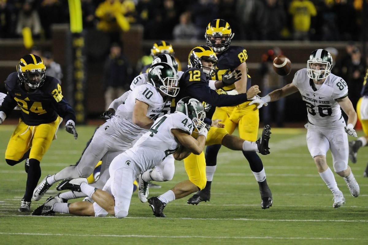 Michigan punter Blake O'Neill impressively handles his first press