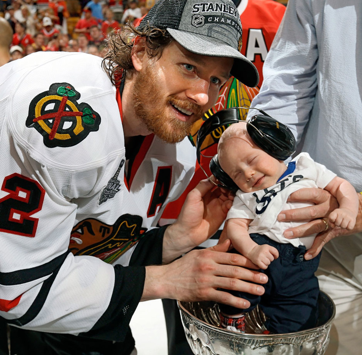 Blackhawks player puts his baby in the Stanley Cup